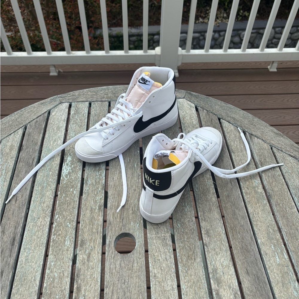Nike Woman’s White and Black High-Top Sneakers